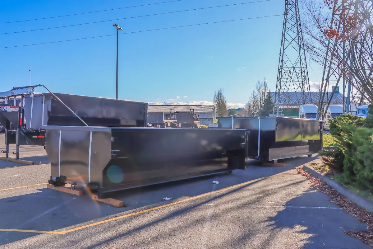 Roll-off dumpster ready for waste disposal at job site for Concrete Dumpster Rental in Whiteland